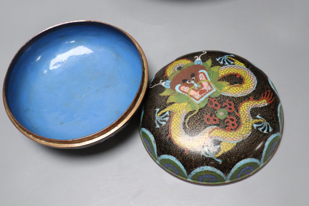 An early 20th century Chinese cloisonne enamel dragon bowl, a similar box and cover and a ginger jar and cover, largest diameter 30cm